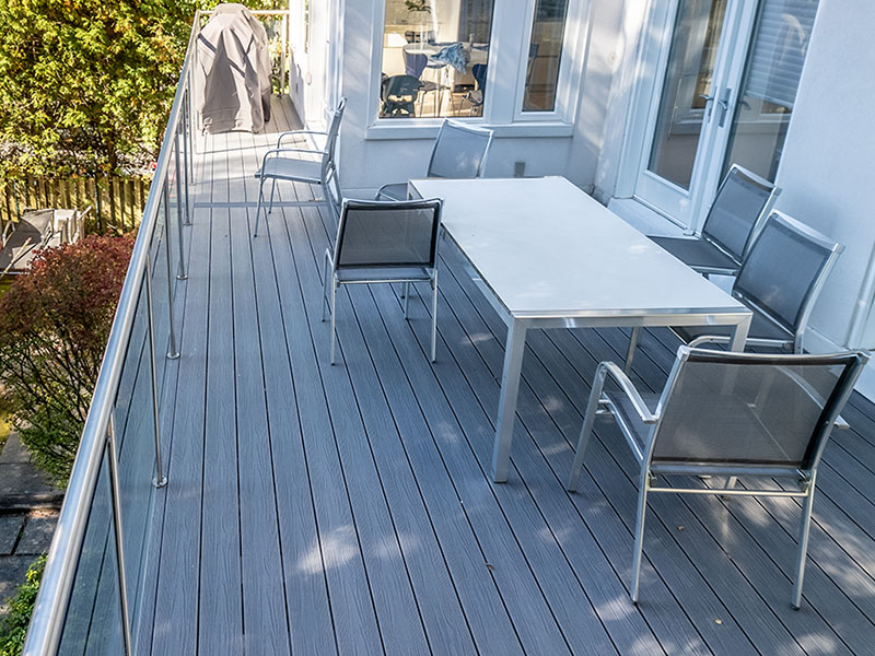 Deck view of the Midtown Toronto project with table and chairs.