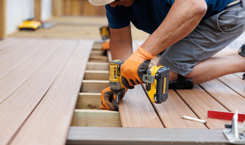 Image of installation of smooth and durable composite deck for outdoor recreation